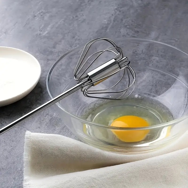 Manual Egg Beater – Hand Press Self-Rotating Kitchen Whisk