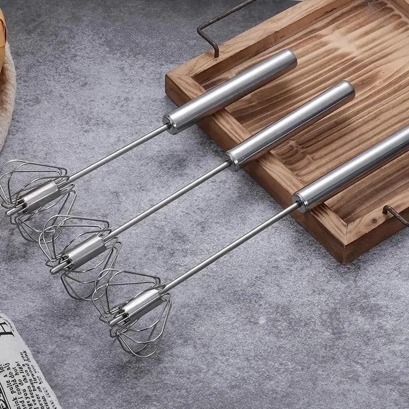 Manual Egg Beater – Hand Press Self-Rotating Kitchen Whisk