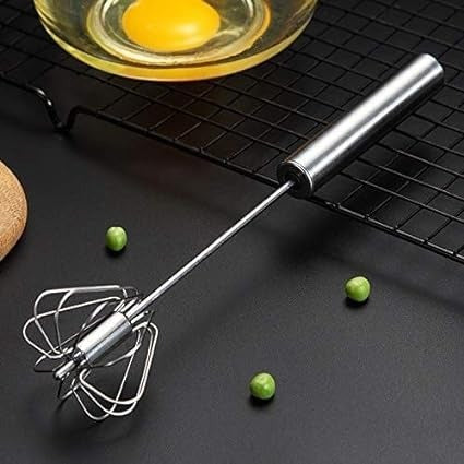 Manual Egg Beater – Hand Press Self-Rotating Kitchen Whisk